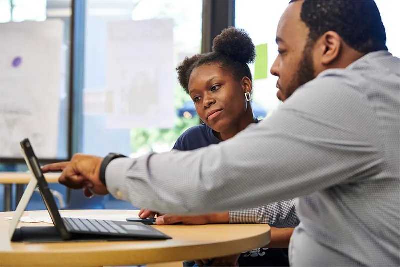 Admissions advisor with student